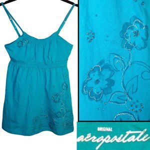 Turquoise tank top w/floral pattern